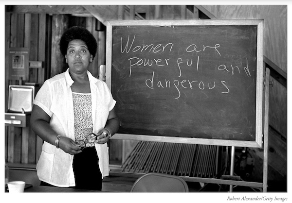 photo of Audre Lorde by Robert Alexander showing the quote Women are powerful and dangerous